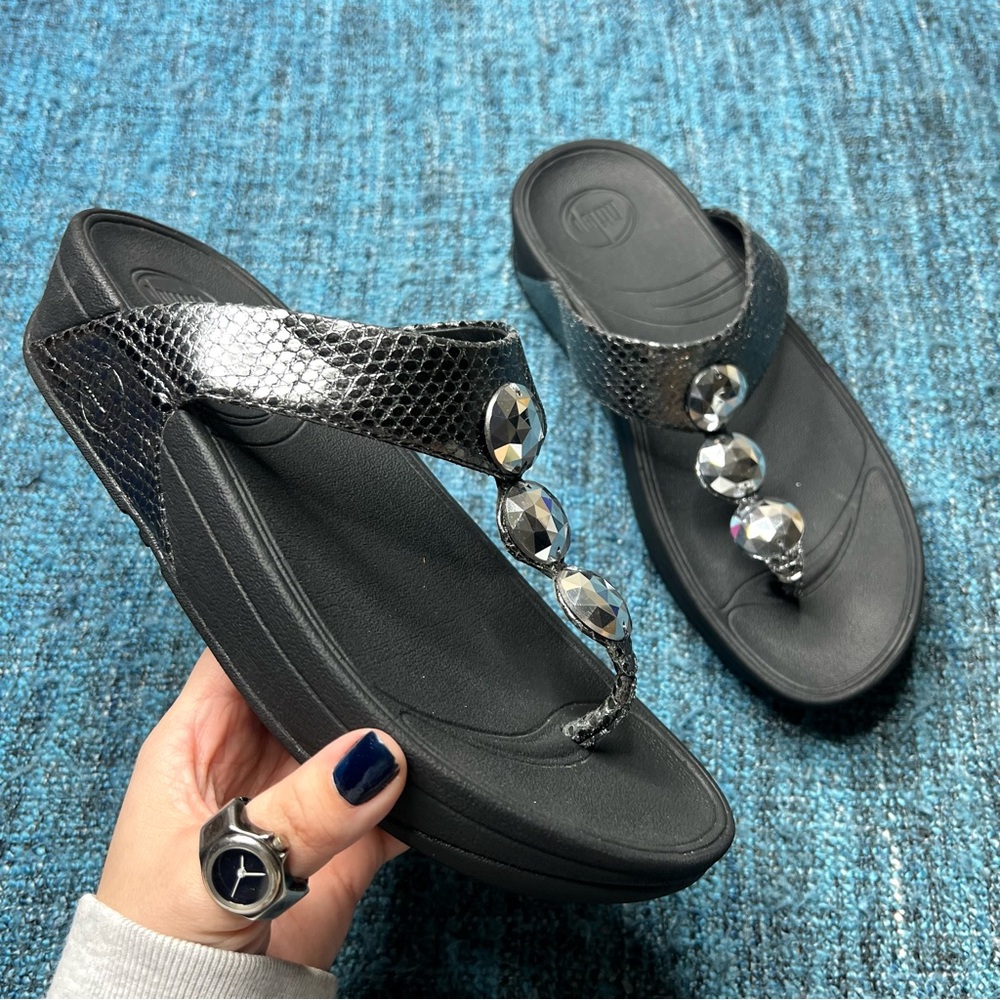 Fitflop Petra Leathered Jeweled Flip Flop Wedge Sandals in Black Metallic